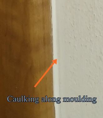 caulk mouldings in the home